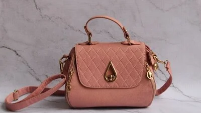 Want to own a designer bag without overspending? These expert tips can help you shop