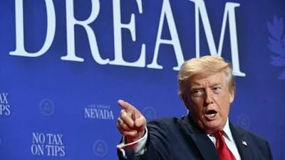 Trump praised after viral video of chasing toddler on stage, making Biden quip: