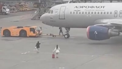 Women run across Moscow airport tarmac to board aircraft, video goes viral