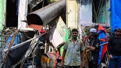 MUMBAI: Ten people had a lucky escape, sustaining minor injuries, when the boom of a 250-tonne hydraulic