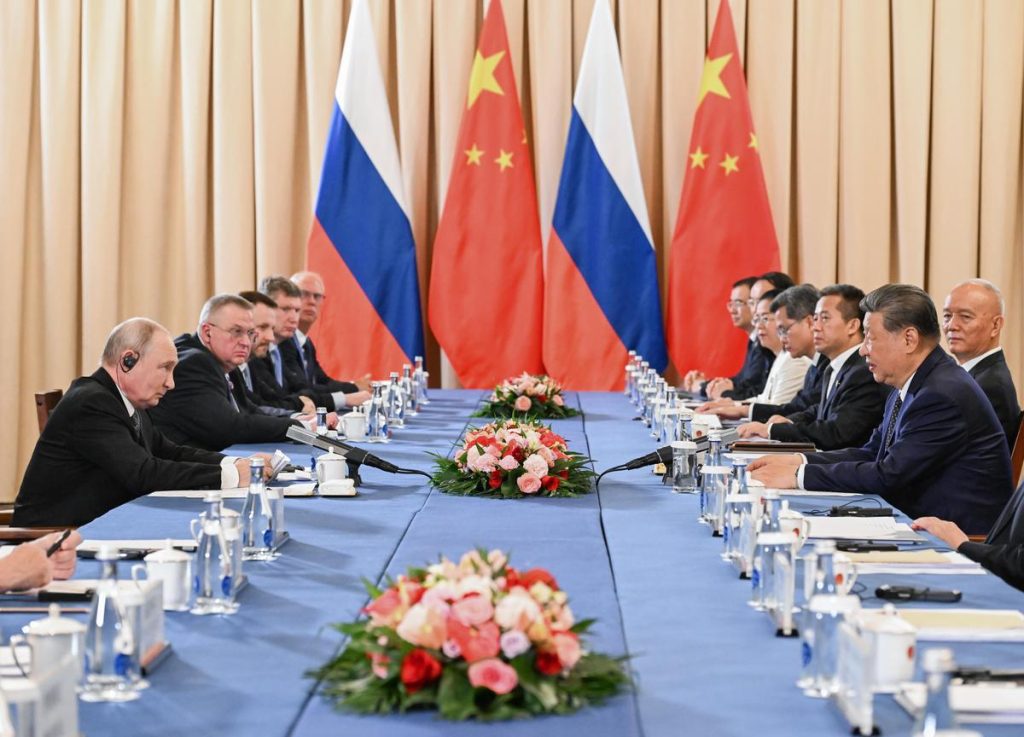 Russian President Vladimir Putin, left, and China's President Xi: A practical reader guide