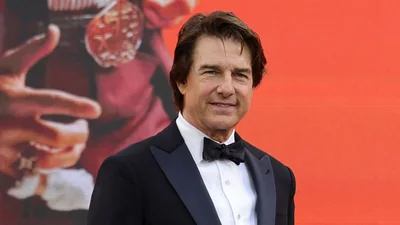 Tom Cruise comforts 'sad' woman at workplace, internet amused: A practical reader guide