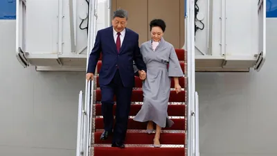 As the two descended the stairs from their plane on Wednesday, Xi: A practical reader guide