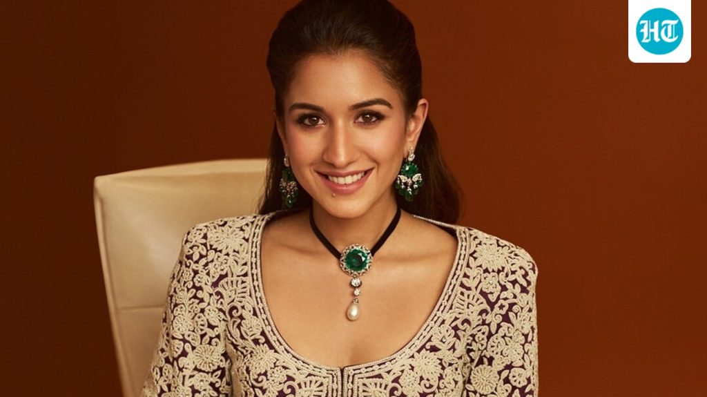 At the event, she wore an embroidered jacket-style top with a printed: A practical reader guide