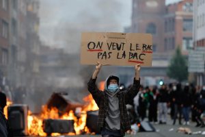 French students set fire to bins and erected blockades outside: A practical reader guide