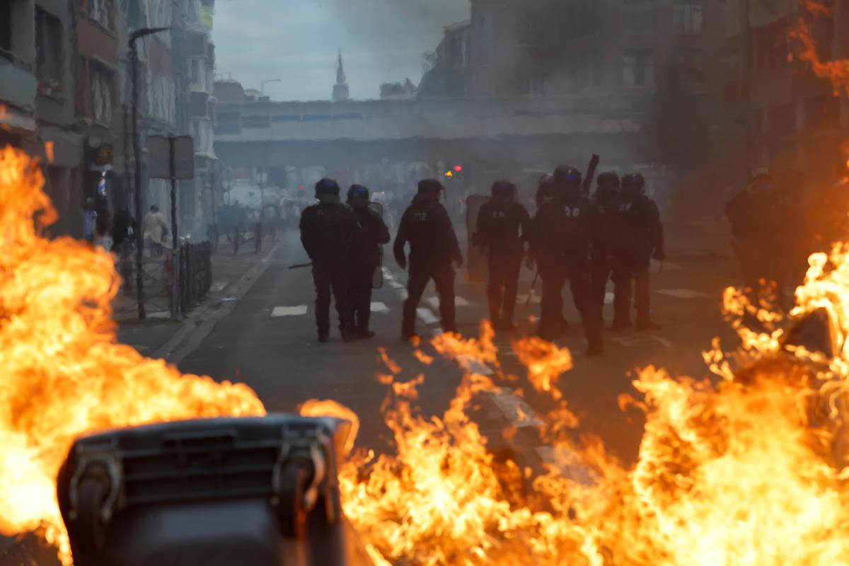 French students set fire to bins and erected blockades outside: A practical reader guide